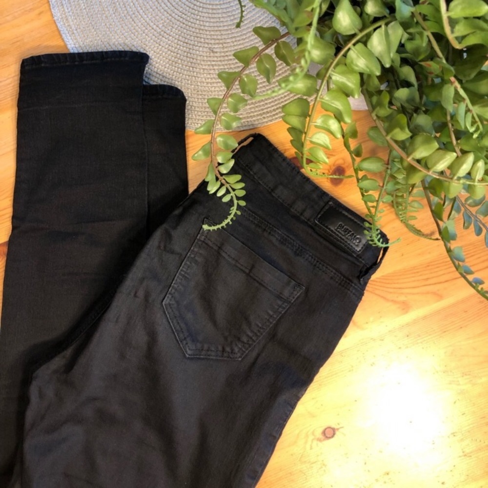 Black buffalo skinny jeans